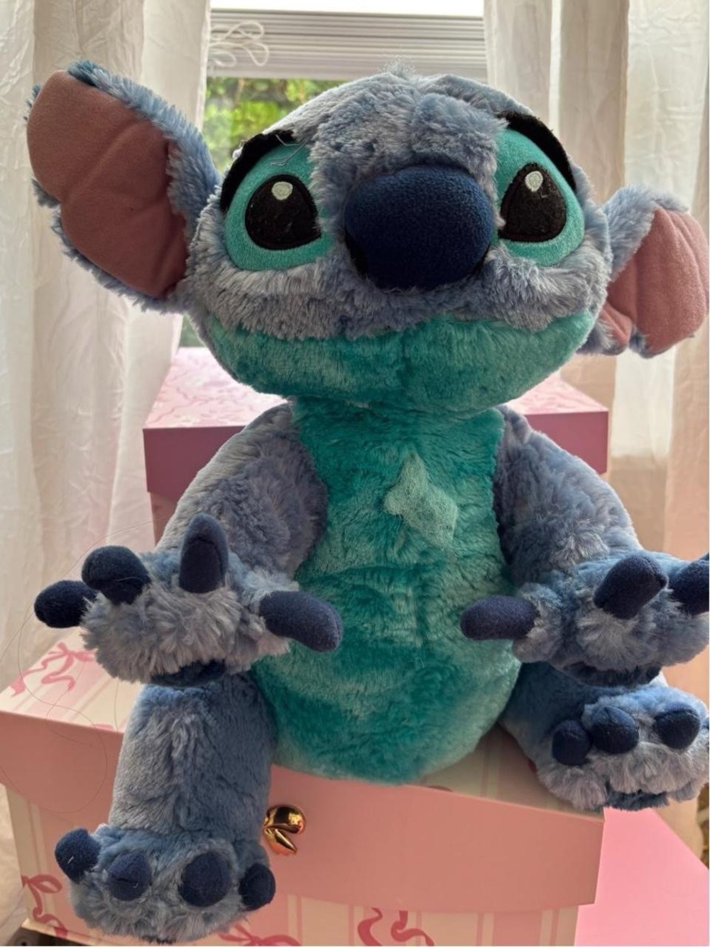 Large 12-14in Disneyland Stitch plush with blue and teal fur.